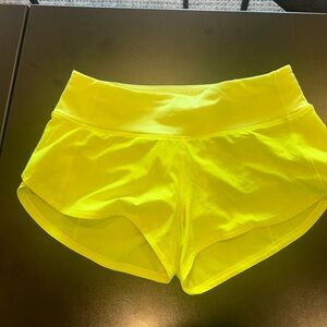 Lululemon shorts neon green. Size Adult 2